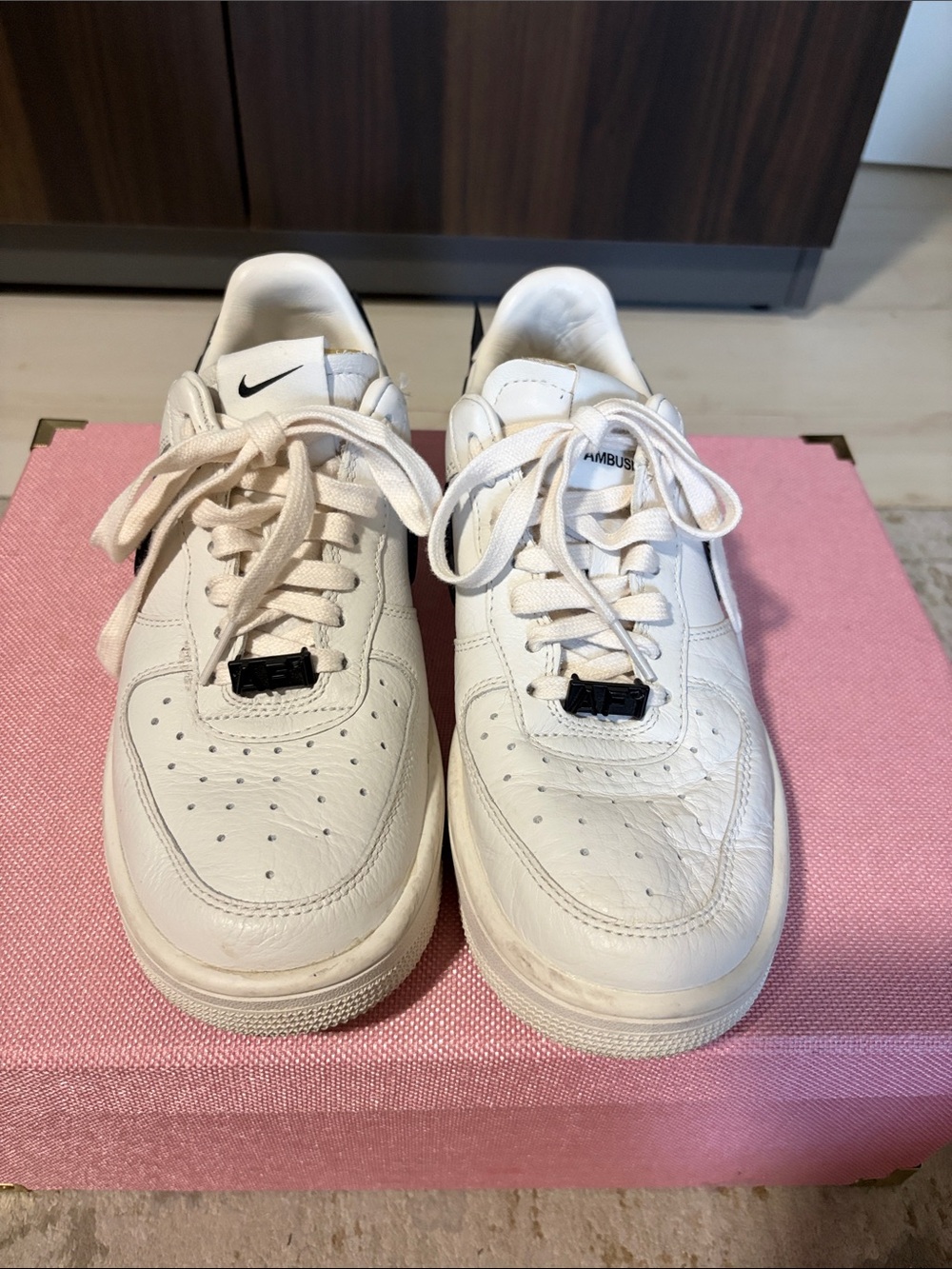 Nike White Low-Top Leather Sneakers with Black Lace Lock